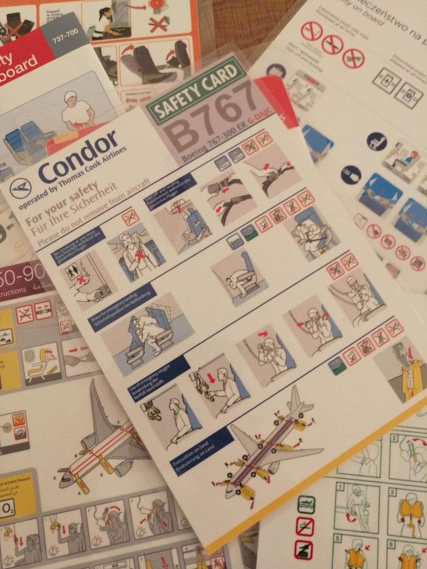 Lot of 10 Airline Safety Cards | Qatar Lufthansa Emirates LTE Condor Thai KLM | Boeing Airbus