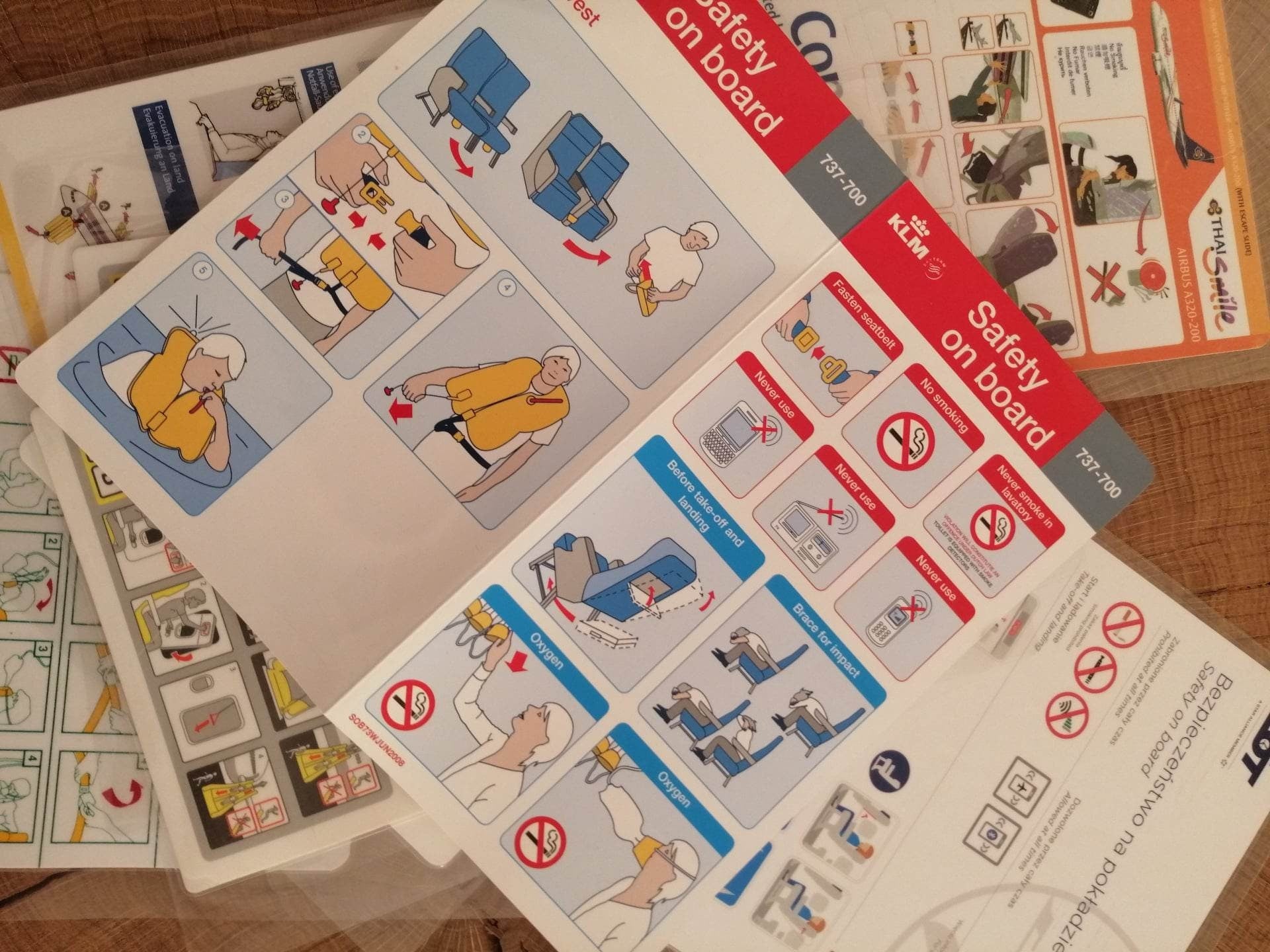 Lot of 10 Airline Safety Cards | Qatar Lufthansa Emirates LTE Condor Thai KLM | Boeing Airbus