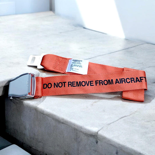 Aircraft Safety Demonstration Original Seat Belt Do Not Remove from Aircraft Orange